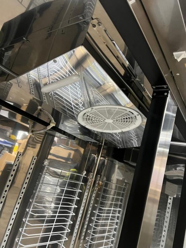 Brand new Blue Air BSR49T-HC stainless steel 2-door reach-in refrigerator on casters, featuring poly-coated wire racks.