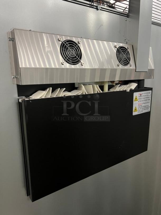 Blue Air BSR49THC stainless steel 2-door reach-in refrigerator, new condition, top mount, with fans and warning labels visible.