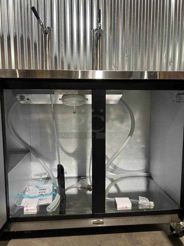 Brand new Blue Air BDD592B black 2-door kegerator with stainless steel worktop, dual tap towers, and drip tray. Model SN: BWW-BABD59-0004.