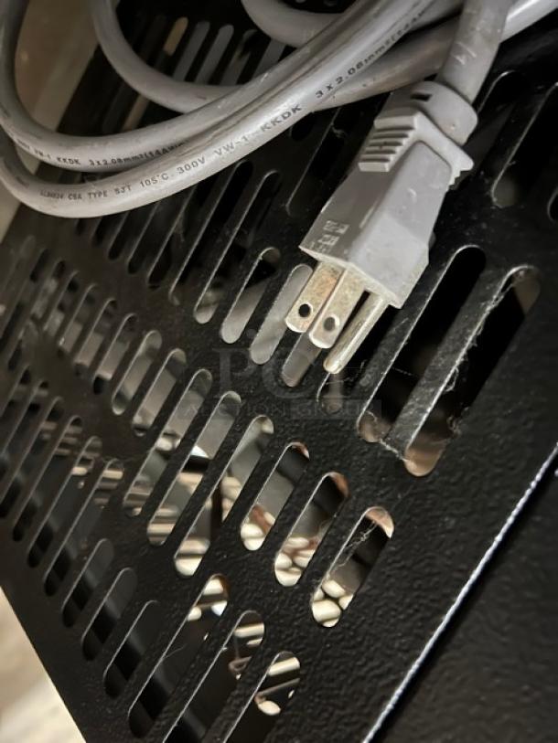 Power cord and vent detail of Blue Air Model BDD592B beer dispenser, showing sturdy build and efficient cooling features.