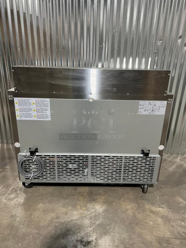 New Blue Air BLPT48HC refrigerated prep table, stainless steel, dual-door, with cutting board and food pan, on casters.
