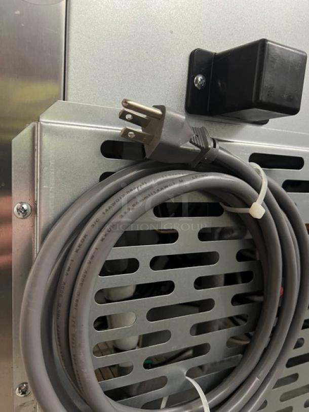 Stainless steel panel of Blue Air BLPT48HC prep table with cord, power port, and ventilation slats. Brand new condition.