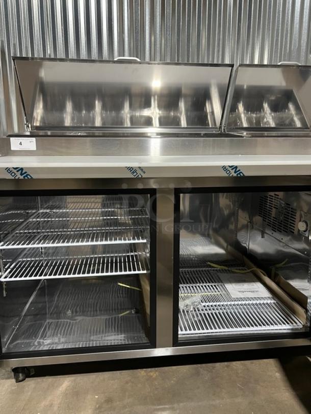 Blue Air Stainless Steel 2 Door Refrigerated Pizza Prep Table, Model BAPP67, with cutting board, food pan, and poly-coated racks.