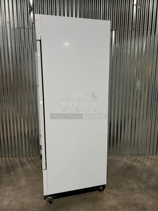 Brand new 2024 Blue Air BGM23W-HC commercial reach-in merchandiser refrigerator, single glass door, on casters.