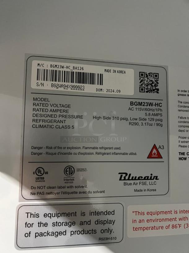 Brand new Blue Air BGM23W-HC reach-in refrigerator; commercial; single glass door; white; poly-coated rack; on casters.
