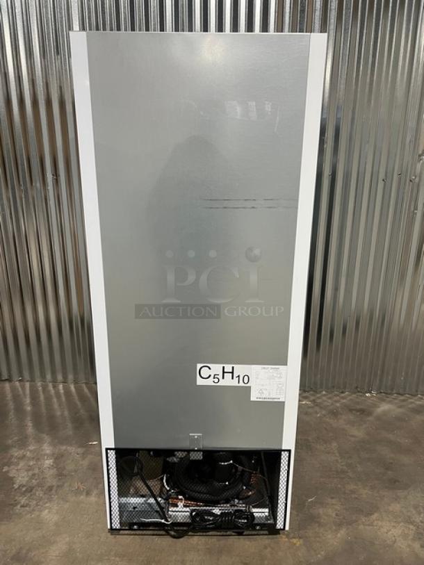 Brand new Blue Air BKGM12-HC commercial reach-in merchandiser refrigerator, black & white, single glass swing door, on casters.