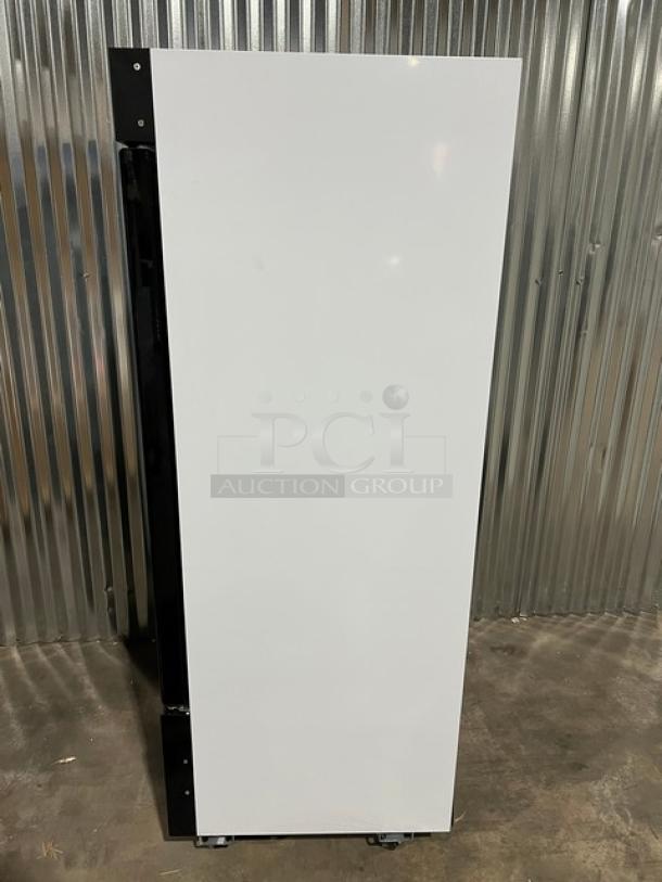 Brand new Blue Air BKGM12HC commercial merchandiser refrigerator, single glass swing door, black and white finish, on casters.