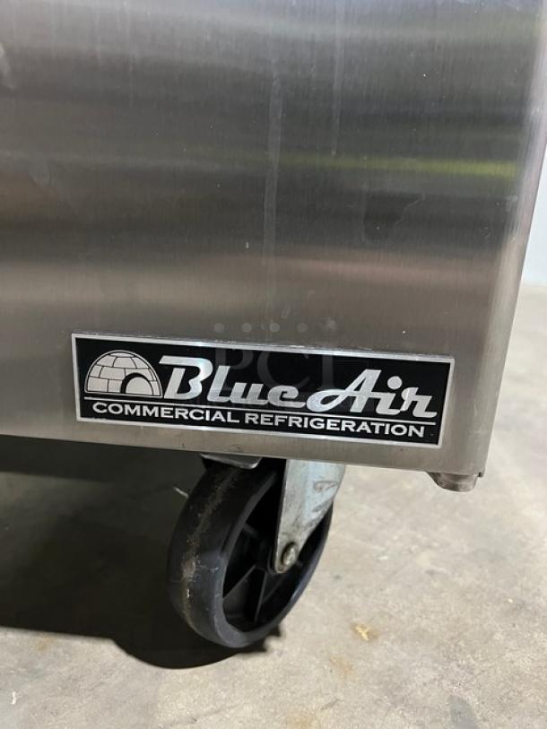 Blue Air BAUR28 stainless steel undercounter refrigerator, brand new, single door, on casters with poly coated wire rack.