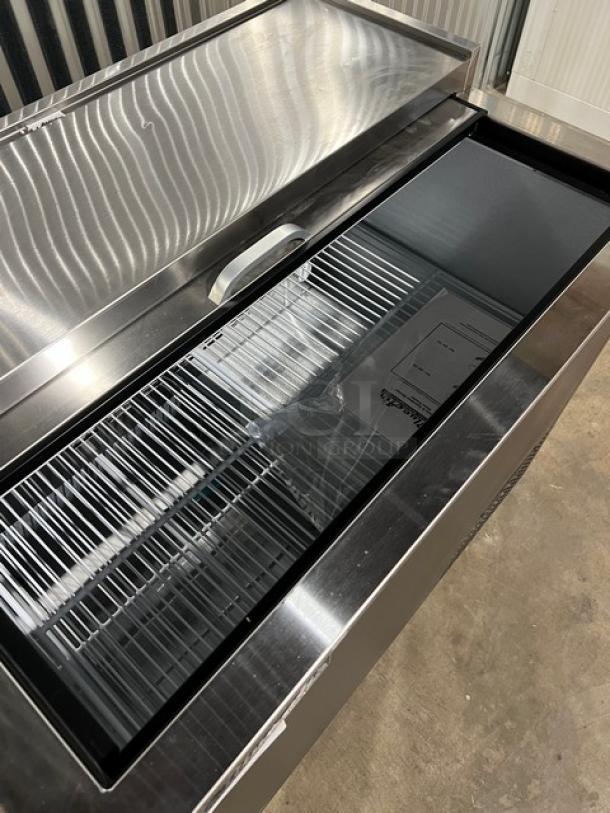 Blue Air BGF36B 36" glass froster/bottle cooler, brand new, black with stainless steel worktop, slide-back lid, poly-coated rack, on casters.