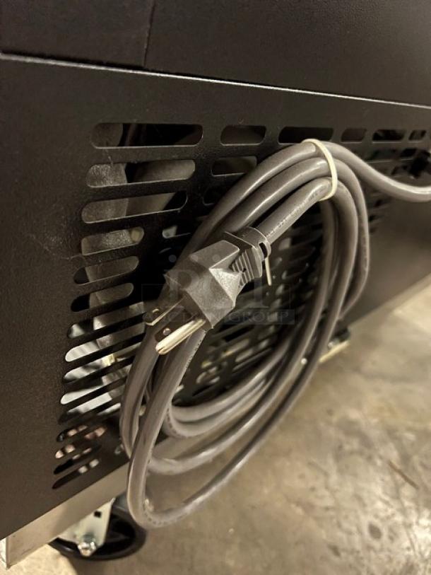 Blue Air BGF36B black glass froster, new, with stainless worktop, slide-back lid, poly-coated rack, and casters. 115V, 1 phase.