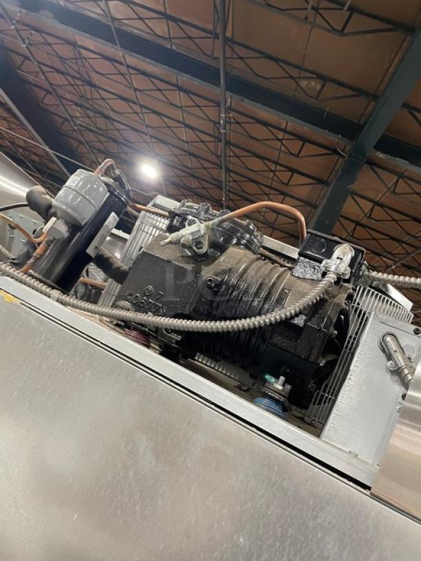 Master-Bilt IHC48 stainless steel ice cream hardening cabinet, scratch-n-dent, model label visible, top compressor view.