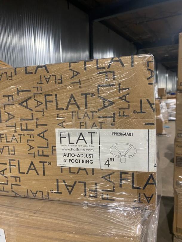 Mixed pallet of commercial items, including Flat Tech Auto-Adjust 4" Foot Ring, Model FPR2064A01, in original packaging.