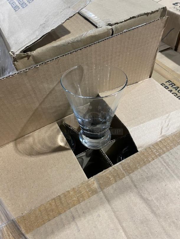 Mixed pallet of Libbey glassware including various series and models. Boxes labeled "Fragile" with clear glass visible.