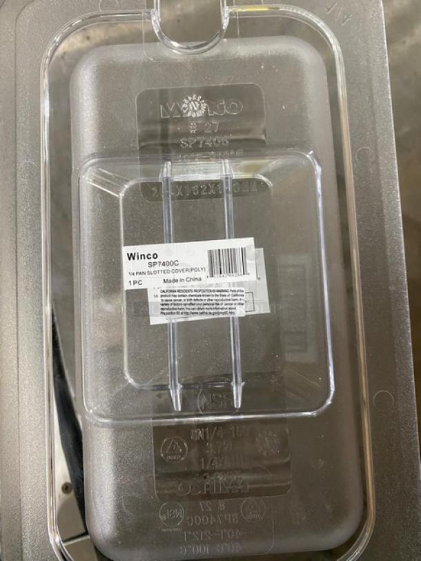 Winco SP7406/SP7400C clear polycarbonate 1/4-size food pan, 6" deep, with slotted lid. Brand new with labels.