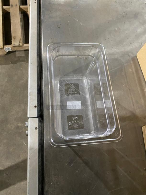 Brand new Winco clear polycarbonate 1/4-size food pan, model SP7406, with slotted lid SP7400C, 6" deep.