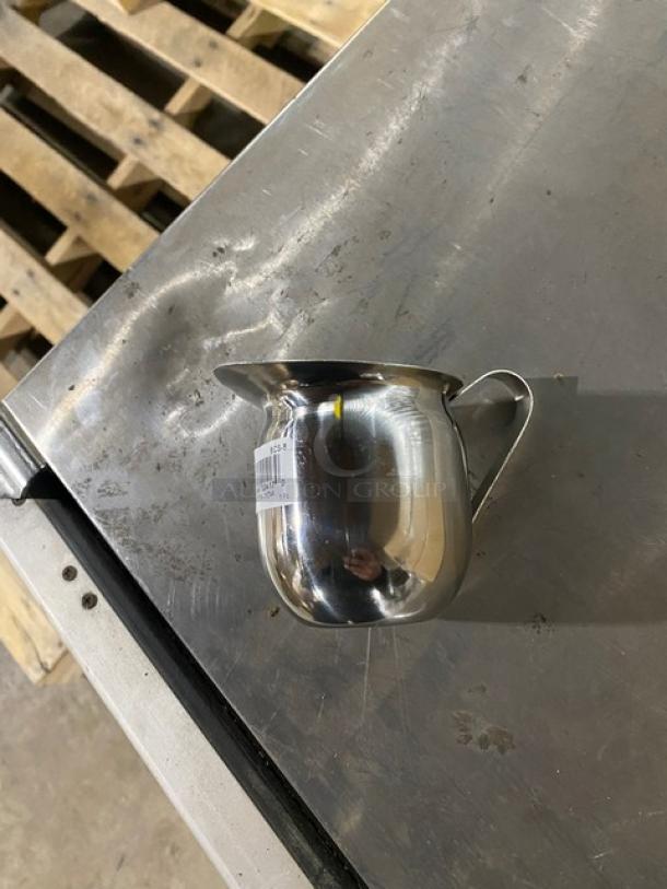 Winco BCS-8 stainless steel 8 oz. bell creamer, brand new, with label. Sold as 12 per case. Perfect condition.