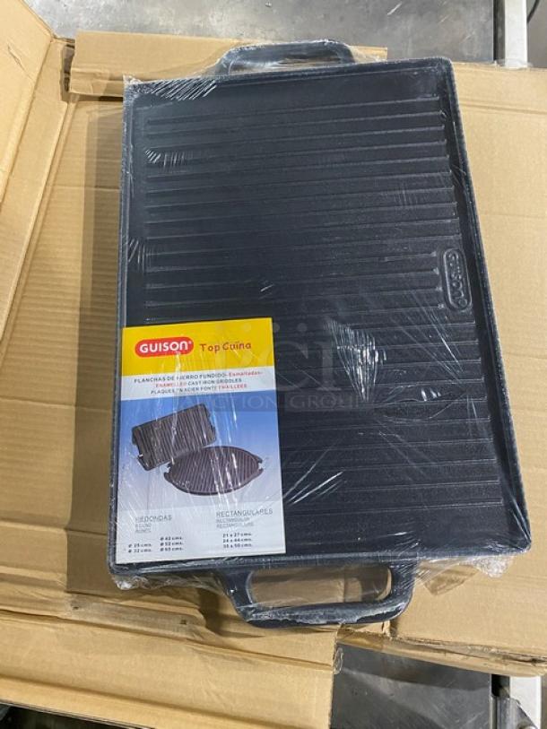 Brand new Guison cast iron plancha griddle, 35x50cm, black enamel, rectangular, with handles in original packaging.