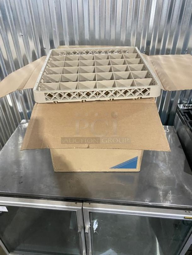Brand new Vollrath Traex Series beige rack extender, model TRC, with 36 compartments, shown atop an open box.