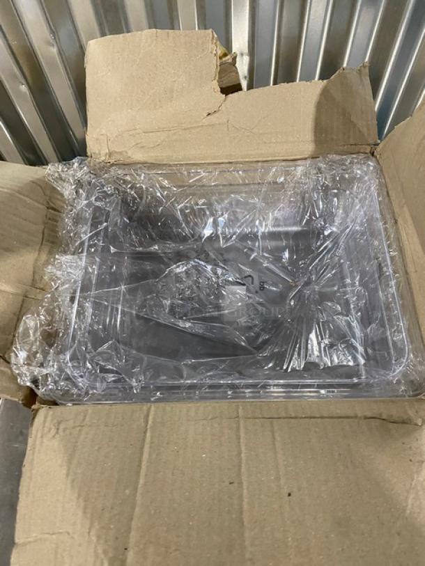 Winco SP7204 clear polycarbonate 1/2-size food pan, new, 4" deep, in packaging, commercial-grade durability.