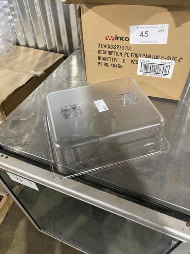 Brand new Winco SP7204 clear polycarbonate 1/2-size 4" deep food pan, shown with box, pristine condition.