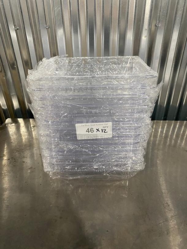 Brand new Winco SP7202 polycarbonate food pans, 1/2-size, 2.5" deep, clear, in original packaging, auction lot of 12.