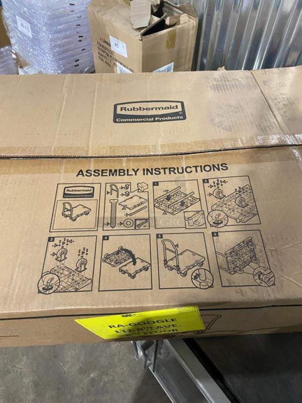 Rubbermaid Commercial platform truck box with assembly instructions, labeled FG440300BLA, new condition with scratch-n-dent.