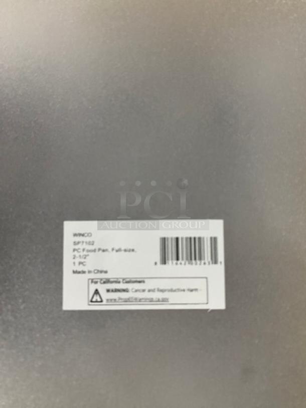 Brand new Winco SP7102 full-size food pan, clear polycarbonate, 2.5" deep, includes barcode and safety warning label.