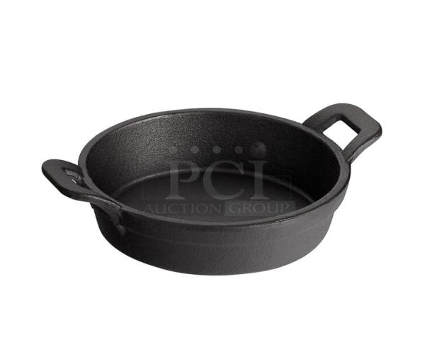 Brand new TableCraft CW30142 pre-seasoned black cast iron server, 18 oz, mini casserole dish, with dual handles.