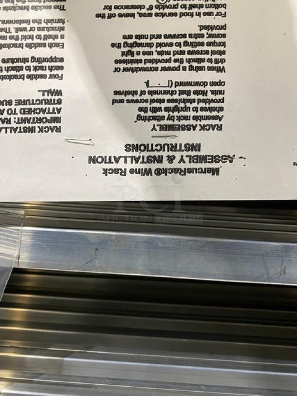 BRAND NEW Marcus Rack Commercial Stainless Steel Full-Bottle Wine Shelves, featuring assembly instructions.