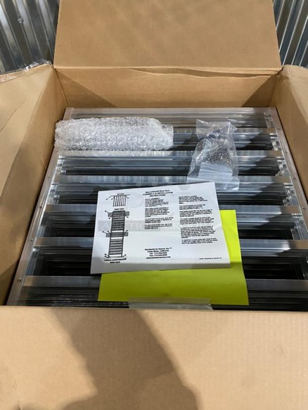 Brand new Marcus Rack stainless steel wine shelves in box, includes assembly instructions and hardware.