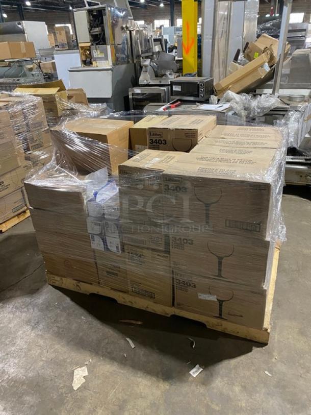 Mixed pallet with brand new Libbey commercial glassware; includes hand-blown Super Bowl glass, wine goblets, mini martini glasses, and TableCraft cruet set. Packaged cases visible, model numbers marked.