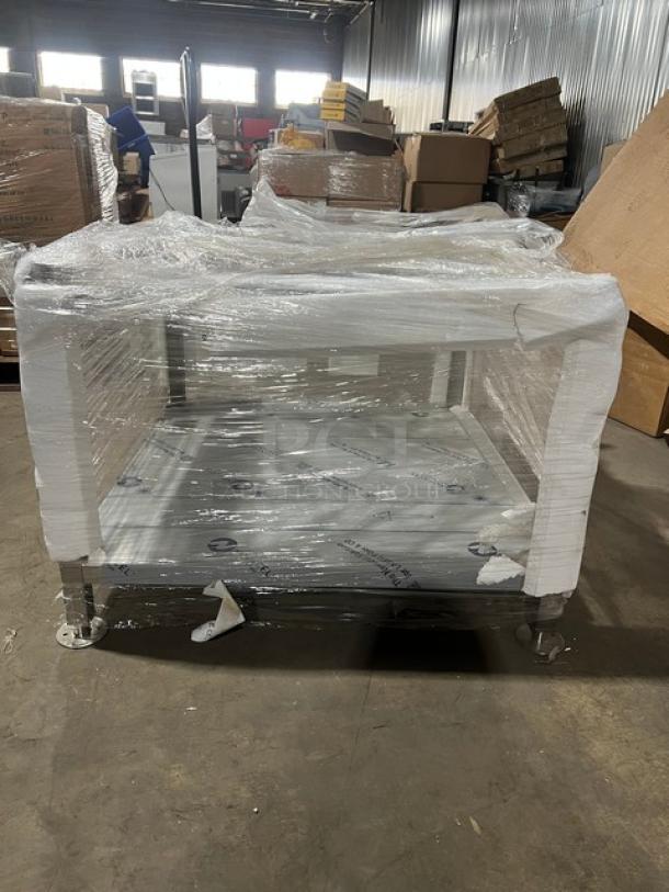 Brand new Alto-Shaam stainless steel Combitherm Combi Oven Stand, 24"x38", Model 5016083, single undershelf, on legs.