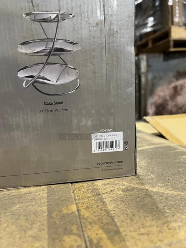 Steelite International Robert Welch Drift Series 3-tier cake stand in box, model DRFBR3445V, stainless steel, mirror finish.