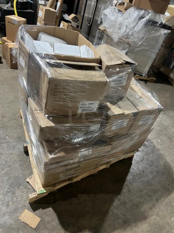 Mixed pallet of commercial kitchenware including Yanco Ocean Series 9" plates, Vollrath lids, syrup servers, and more, wrapped and boxed.