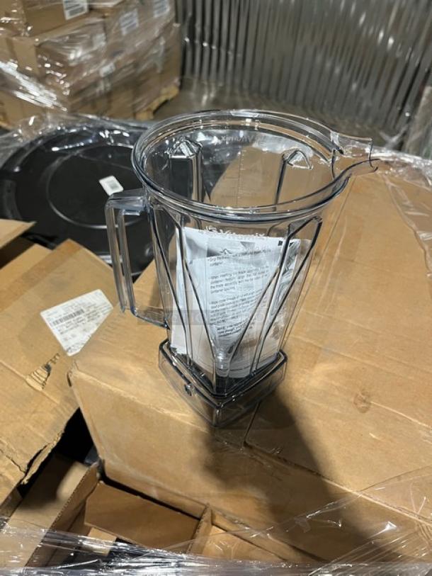 Brand new mixed pallet with Vitamix VM0135 blender jar, 2L capacity, in clear plastic; part of a commercial kitchen supply auction.