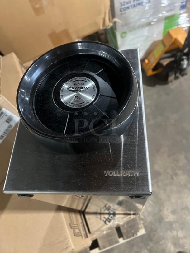 Brand new Vollrath stainless steel single-slot countertop cup dispenser cabinet, model 58821A, with logo and model label.