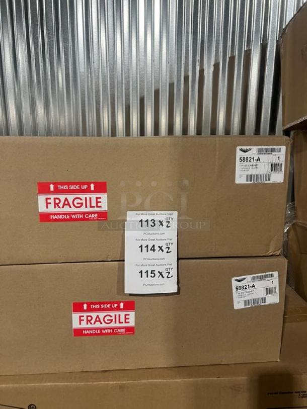 Brand new Vollrath stainless steel single-slot countertop cup dispenser, Model 58821A, in original packaging with fragile labels.