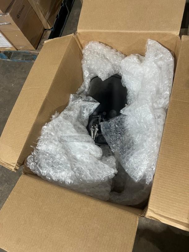 Brand new Steelite D.W. Haber black-coated coffee chafer urn with polished accents in box. Includes Vollrath Model 46060 heater, 120V.