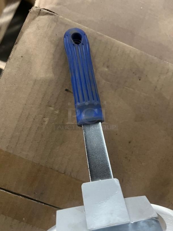 Brand new Vollrath Wear-Ever Series 10" aluminum fry pan, model 4010, with blue grip handle and natural finish.