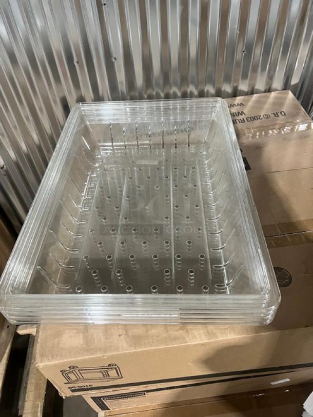 Brand new Cambro Camwear clear polycarbonate 18"x26" colander, model 1826CLRCW135, 5" deep, perforated bottom.