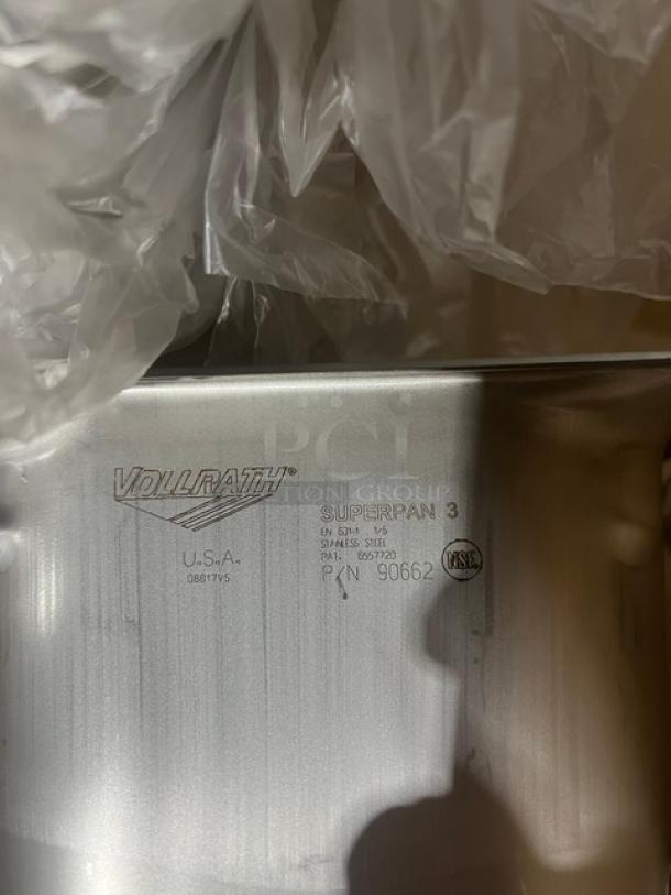 BRAND NEW Vollrath Super Pan 3 Series, stainless steel, 1/6-size, 6" deep anti-jam pan, model 90662, marked with NSF certification.