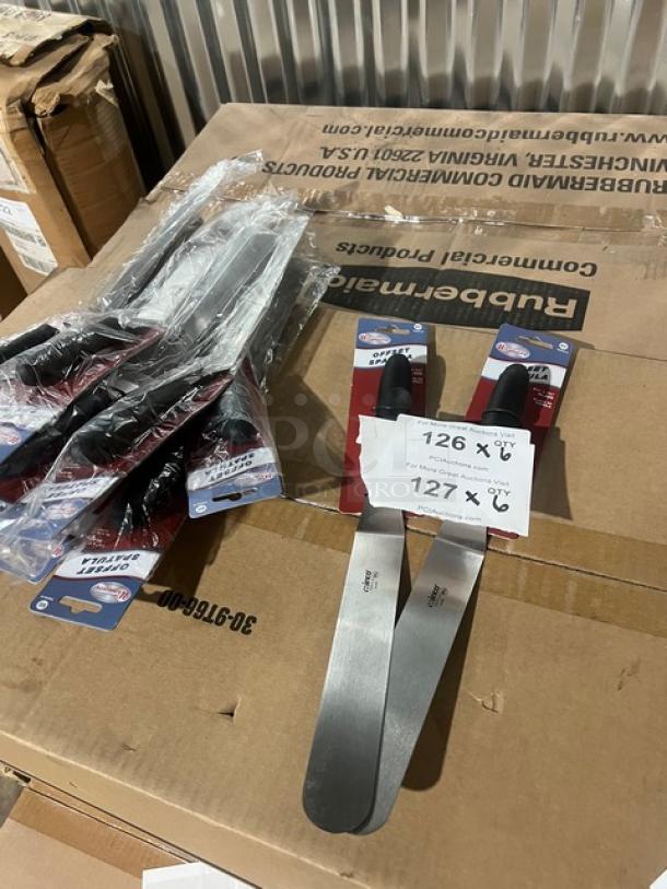 Brand new Winco Winware Series stainless steel offset spatula, model TKPO9, 8-1/2"x1-1/2" with black grip handle.