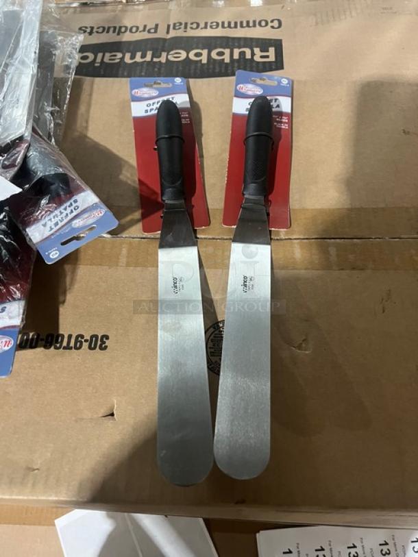Brand new Winco TKPO-9 offset spatula, 8.5"x1.5", stainless steel blade, black grip handle, commercial-grade.