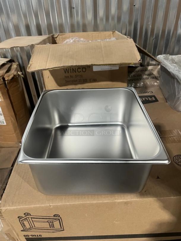 Brand new Winco 2/3-size 6" deep stainless steel steamtable pan, model SPTT6, shown atop its packaging box.