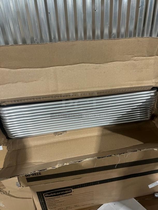 Brand new Vollrath Wear-Ever 9003 aluminum full-size bun/sheet pan, shown stacked in original packaging.