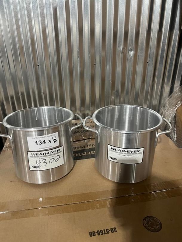 Brand new Vollrath Wear-Ever 9 Qt. aluminum stock pots, Model 4302, with handle labels. Auction lot includes two pots.