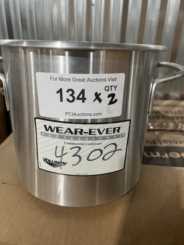 Brand new Vollrath Wear-Ever 9 Qt. aluminum stock pot, model 4302. Labels indicate model and auction details.