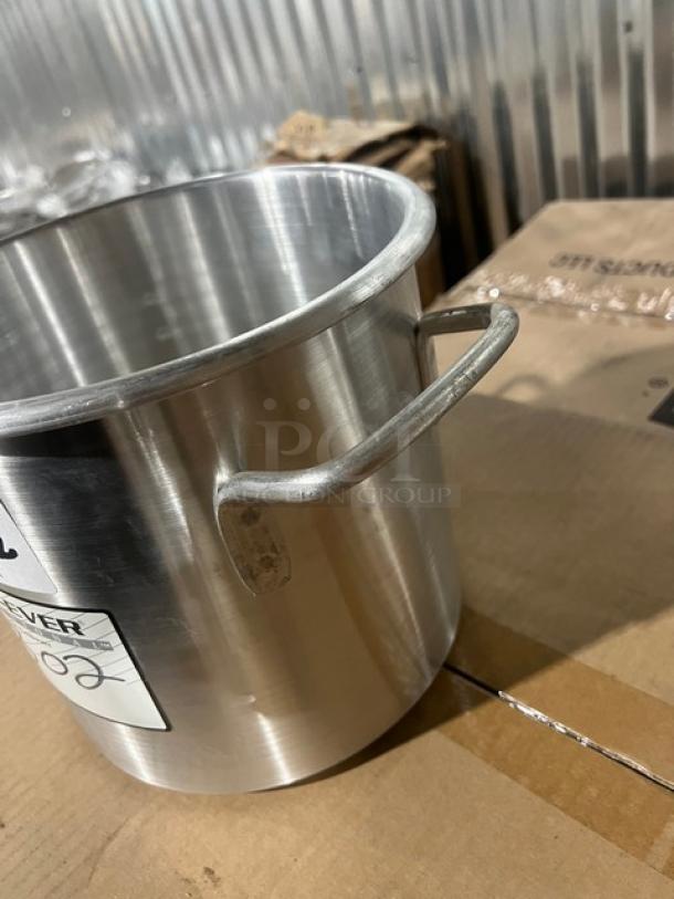 Brand new Vollrath Wear-Ever Series 9 Qt. aluminum stock pot, model 4302, durable construction, commercial-grade.