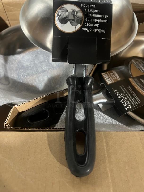 Brand new Vollrath Tribute Series 7" induction-ready fry pan, model 69807, with black grip handle. Tags intact.