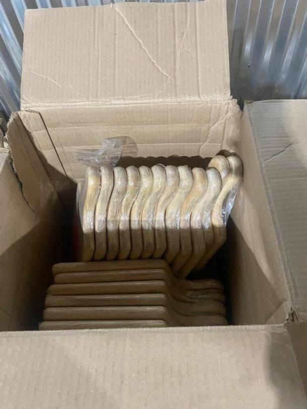 Box of brand new TableCraft 13.5"x7.5" natural wooden bread/charcuterie boards, Model 79. Multiple boards visible.